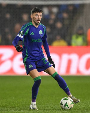 Filip Mladenovi of Panathinaikos controls the ball during the UEFA Conference League - League Stage The New Saints v Panathinaikos at Croud Meadow, Shrewsbury, United Kingdom, 12th December 2024 clipart