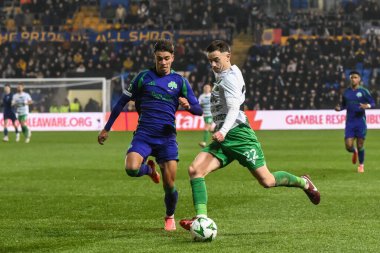 Danny Davies of The New Saints F.C. crosses the ball during the UEFA Conference League - League Stage The New Saints v Panathinaikos at Croud Meadow, Shrewsbury, United Kingdom, 12th December 2024 clipart