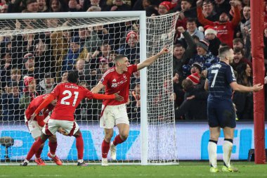 Nottingham Ormanı 'ndan Nikola Milenkovi, İngiltere' nin Nottingham şehrinde 14 Aralık 2024 'te oynanan Premier Lig maçı Nottingham Forest' a karşı Aston Villa maçında 1-1 kazanma hedefini kutluyor.