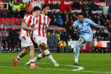 Chris Willock of Cardiff City shoots on goal during the Sky Bet Championship match Stoke City vs Cardiff City at Bet365 Stadium, Stoke-on-Trent, United Kingdom, 14th December 2024 clipart