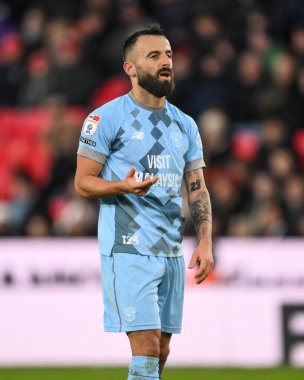 Manolis Siopis of Cardiff Citygives his team instructions during the Sky Bet Championship match Stoke City vs Cardiff City at Bet365 Stadium, Stoke-on-Trent, United Kingdom, 14th December 2024 clipart