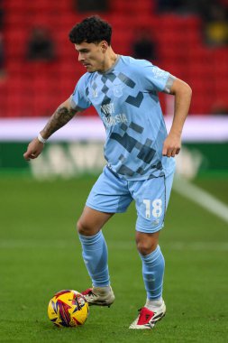 Alex Robertson of Cardiff City makes a break with the ball  during the Sky Bet Championship match Stoke City vs Cardiff City at Bet365 Stadium, Stoke-on-Trent, United Kingdom, 14th December 2024 clipart