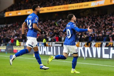 Conor Chaplin of Ipswich Town celebrates his goal to make it 0-1 during the Premier League match Wolverhampton Wanderers vs Ipswich Town at Molineux, Wolverhampton, United Kingdom, 14th December 2024 clipart