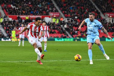 Stoke City 'den Milyon Manhoef, Stoke City' nin Cardiff City 'ye karşı oynadığı 14 Aralık 2024' te Bet365 Stadyumu 'nda oynanan Gökyüzü İddia Şampiyonası maçında gol atarken görülüyor.