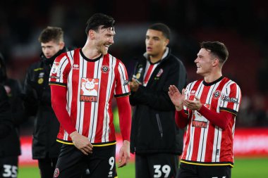 Sheffield United takımından Kieffer Moore ve Sheffield United takımından Jamie Shackleton, 14 Aralık 2024 'te Bramall Lane, Sheffield, İngiltere' de oynanan maçta Sheffield United ve Plymouth Argyle maçını izlediler.