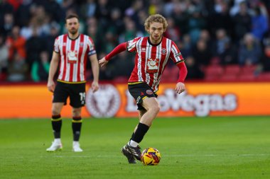 Sheffield United takımından Tom Davies, Sheffield Lane, Sheffield, Birleşik Krallık 'ta 14 Aralık 2024' te Sheffield United ve Plymouth Argyle maçında maç yapıyor.