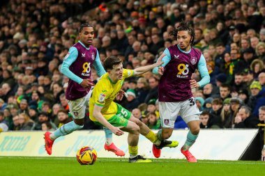 Norwich City 'den Kellen Fisher, Burnley' li Luca Koleosho 'ya 15 Aralık 2024' te Norwich City, Norwich Road, Norwich, İngiltere 'de Burnley' e karşı oynanan Sky Bet Şampiyonası karşılaşmasında meydan okudu.