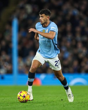 Manchester City 'den Matheus Nunes, Premier League maçında Manchester City ile Manchester United arasında 15 Aralık 2024' te Etihad Stadyumu 'nda bir ara verdi.