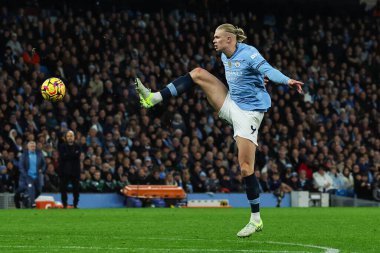 Erling Haaland of Manchester City in action during the Premier League match Manchester City vs Manchester United at Etihad Stadium, Manchester, United Kingdom, 15th December 2024 clipart