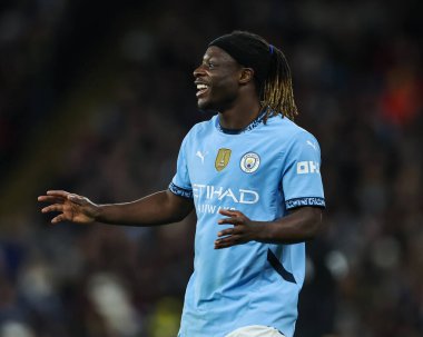 Manchester City 'nin Manchester United' a karşı oynadığı Premier League maçında Manchester City 'den Jeremy Doku, Etihad Stadyumu, Manchester, İngiltere, 15 Aralık 2024