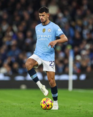 Manchester City 'den Matheus Nunes, Manchester United' a karşı 15 Aralık 2024 tarihinde Etihad Stadyumu 'nda oynanan Premier League maçında