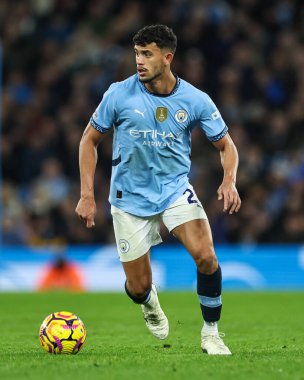 Manchester City 'den Matheus Nunes, Premier League maçında Manchester City ile Manchester United arasında 15 Aralık 2024' te Etihad Stadyumu 'nda bir ara verdi.