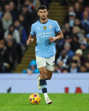 Manchester City 'den Matheus Nunes, Premier League maçında Manchester City ile Manchester United arasında 15 Aralık 2024' te Etihad Stadyumu 'nda bir ara verdi.