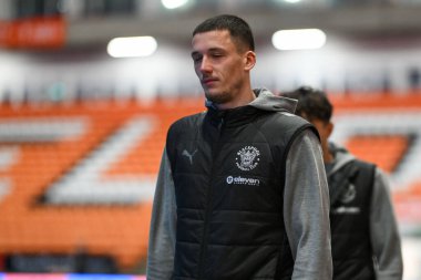 Oliver Casey of Blackpool arrives ahead of the Vertu Trophy match Blackpool vs Aston Villa U21 at Bloomfield Road, Blackpool, United Kingdom, 17th December 2024 clipart