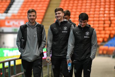 Lee Evans, Zac Ashworth and Rob Apter of Blackpool arrive ahead of the Vertu Trophy match Blackpool vs Aston Villa U21 at Bloomfield Road, Blackpool, United Kingdom, 17th December 2024 clipart