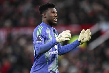 Manchester United 'dan Andr Onana 22 Aralık 2024 tarihinde Old Trafford, Manchester, İngiltere' de oynanan Premier League karşılaşmasında tepki gösterdi.