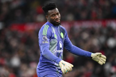 Manchester United 'dan Andr Onana 22 Aralık 2024 tarihinde Old Trafford, Manchester, İngiltere' de oynanan Premier League karşılaşmasında tepki gösterdi.
