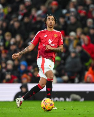 Leny Yoro of Manchester United passes the ball during the Premier League match Manchester United vs Bournemouth at Old Trafford, Manchester, United Kingdom, 22nd December 2024 clipart