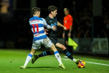 Robbie Brady of Preston North End is put under pressure by Paul Smyth of Queens Park Rangers during the Sky Bet Championship match Queens Park Rangers vs Preston North End at Matrade Loftus Road, London, United Kingdom, 21st December 2024 clipart