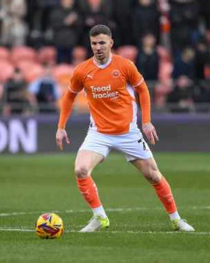 Lee Evans of Blackpool makes a break with the ball during the Sky Bet League 1 match Blackpool vs Stevenage at Bloomfield Road, Blackpool, United Kingdom, 21st December 2024 clipart