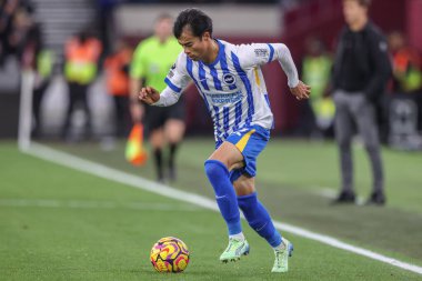 Brighton & Hove Albion takımından Kaoru Mitoma, 21 Aralık 2024 'te Londra Stadyumu' nda oynanan Premier Lig karşılaşmasında West Ham United - Brighton ve Hove Albion maçında topu aldı.