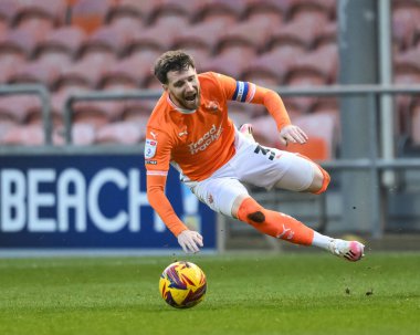 Blackpool 'dan James Husband, 21 Aralık 2024' te Bloomfield Road, Blackpool 'da oynanan Sky Bet Ligi 1 karşılaşmasında Stevenage' e karşı Louis Thompson 'dan faul aldı.