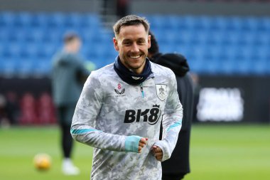 Josh Brownhill of Burnley smiling while warming up before the Sky Bet Championship match Burnley vs Watford at Turf Moor, Burnley, United Kingdom, 21st December 2024 clipart