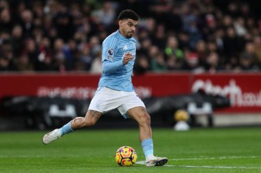 Nottingham Ormanı 'ndan Morgan Gibbs-White Premier League maçında pas veriyor Brentford Nottingham Ormanı' na karşı Gtech Community Stadyumu, Londra, 21 Aralık 2024