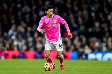 Southampton 'dan Yukinari Sugawara Premier Lig maçında topla koşuyor Fulham, Southampton' a karşı Craven Cottage, Londra, 22 Aralık 2024