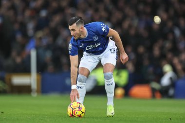 Everton 'dan Jack Harrison 22 Aralık 2024' te Goodison Park, Liverpool, İngiltere 'de oynanan Premier League maçında Everton Chelsea' ye karşı sert rüzgarda hareket eden topu durdurmaya çalışıyor.