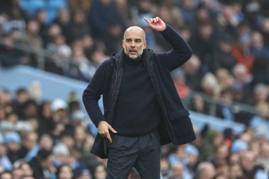 Manchester City teknik direktörü Pep Guardiola, Premier League maçında Manchester City Everton 'a karşı Etihad Stadyumu' nda 26 Aralık 2024 'te teknik alanda tepki gösterdi.