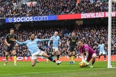 Everton 'dan Jordan Pickford, Manchester City' nin Everton 'a karşı oynadığı Premier Lig karşılaşmasında Manchester City' den Bernardo Silva 'nın 26 Aralık 2024' te Etihad Stadyumu 'nda attığı şutu kurtardı.
