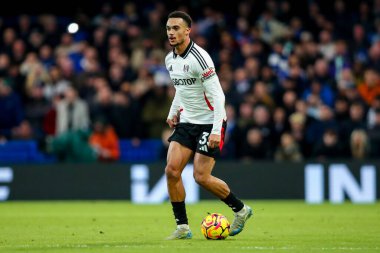 Fulham 'dan Antonee Robinson Premier Lig maçında topla koşuyor Chelsea Fulham' a karşı Stamford Bridge, Londra, 26 Aralık 2024