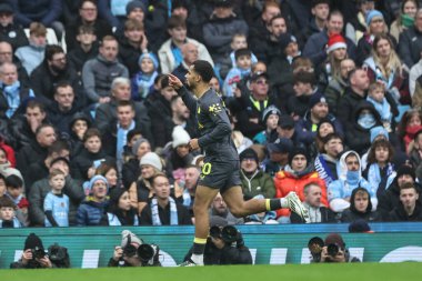 Everton 'dan Iliman Ndiaye, Premier League maçında Manchester City' nin Everton 'a karşı 26 Aralık 2024' te Etihad Stadyumu 'nda 1-1 kazanma hedefini kutluyor.