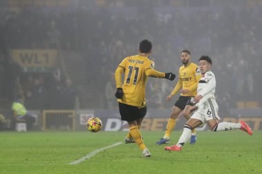 Hwang Hee-Chan of Wolverhampton Wanderers scores a goal to make it 2-0 during the Premier League match Wolverhampton Wanderers vs Manchester United at Molineux, Wolverhampton, United Kingdom, 26th December 2024 clipart