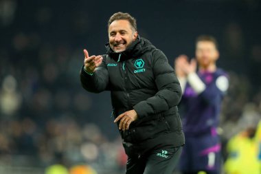 Vitor Pereira of Wolverhampton Wanderers celebrates with the fans after the teams draw following during the Premier League match Tottenham Hotspur vs Wolverhampton Wanderers at Tottenham Hotspur Stadium, London, United Kingdom, 29th December 2024 clipart