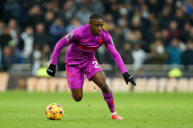 Jean-Ricner Bellegarde of Wolverhampton Wanderers breaks with the ball during the Premier League match Tottenham Hotspur vs Wolverhampton Wanderers at Tottenham Hotspur Stadium, London, United Kingdom, 29th December 2024 clipart