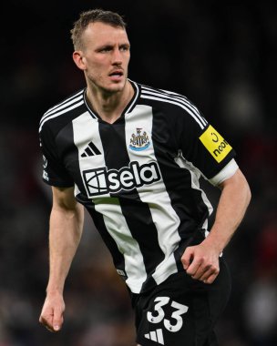 Newcastle United 'dan Dan Burn Premier League maçı sırasında Manchester United ile Newcastle United arasında Old Trafford, Manchester, Birleşik Krallık' ta, 30 Aralık 2024