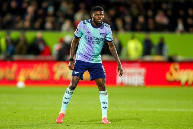 Thomas of Arsenal, 1 Ocak 2025 'te İngiltere' deki Gtech Community Stadyumu 'nda oynanan Premier League karşılaşmasında Brentford' a karşı Arsenal 'i izliyor.