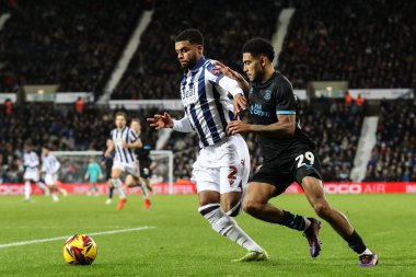 West Bromwich Albion 'dan Darnell Furlong ve Preston North End' den Kaine Kesler Hayden, Sky Bet Şampiyonası 'nda West Bromwich Albion, Preston North End' e karşı The Hawthorns, West Bromwich, Birleşik Krallık 'ta 1 Ocak 2025' te oynanan karşılaşmada top için mücadele ediyorlar.