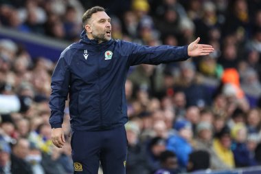 John Eustace manager of Blackburn Rovers reacts in the technical area during the Sky Bet Championship match Leeds United vs Blackburn Rovers at Elland Road, Leeds, United Kingdom, 1st January 2025 clipart