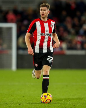 Brentford 'dan Nathan Collins, 1 Ocak 2025' te Londra 'daki Gtech Community Stadyumu' nda Brentford Arsenal 'e karşı oynanan Premier League maçında topla koşuyor.