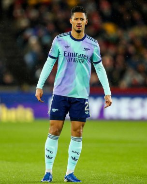 William Saliba of Arsenal looks on during the Premier League match Brentford vs Arsenal at The Gtech Community Stadium, London, United Kingdom, 1st January 2024 clipart