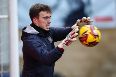 Blackpool 'dan Harry Tyrer 4 Ocak 2025' te Adams Park, High Wycombe 'da Wycombe Wanderers' a karşı oynanan Sky Bet 1 maçı öncesinde ısınma turunda