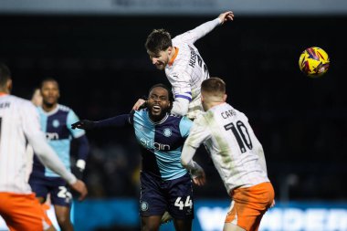 Blackpool 'dan James Husband, 4 Ocak 2024' te Adams Park, High Wycombe, İngiltere 'de Wycombe Wanderers' a karşı oynanan Sky Bet 1 karşılaşmasında topu sürüyor.