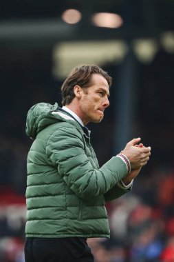 Burnley 'den Scott Parker, 4 Ocak 2024' te Blackburn Park, Blackburn, İngiltere 'de oynanan Blackburn Rovers-Burnley maçından önce deplasman taraftarlarını alkışlıyor.