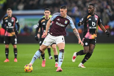 Ross Barkley of Aston Villa makes a break with the ball during the Premier League match Aston Villa vs Leicester City at Villa Park, Birmingham, United Kingdom, 4th January 2024 clipart