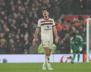 Harry Maguire of Manchester United reacts during the Premier League match Liverpool vs Manchester United at Anfield, Liverpool, United Kingdom, 5th January 2024 clipart