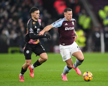 Ross Barkley of Aston Villa holds off Bilal El Khannouss of Leicester City  during the Premier League match Aston Villa vs Leicester City at Villa Park, Birmingham, United Kingdom, 4th January 2025 clipart