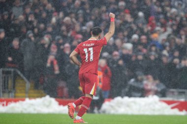 Liverpool 'lu Mohamed Salah, 5 Ocak 2024' te İngiltere 'nin Liverpool kentinde oynanan Premier League maçı sırasında Manchester United' a karşı 2-1 'lik galibiyet golünü kutluyor.